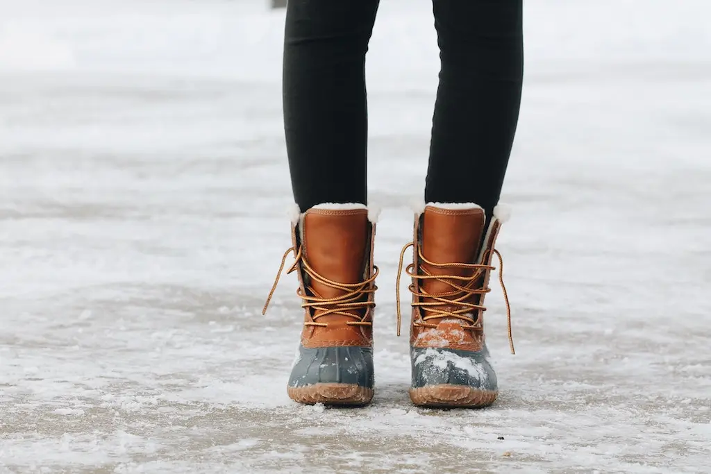 Fleece lined winter boots on snowy ground