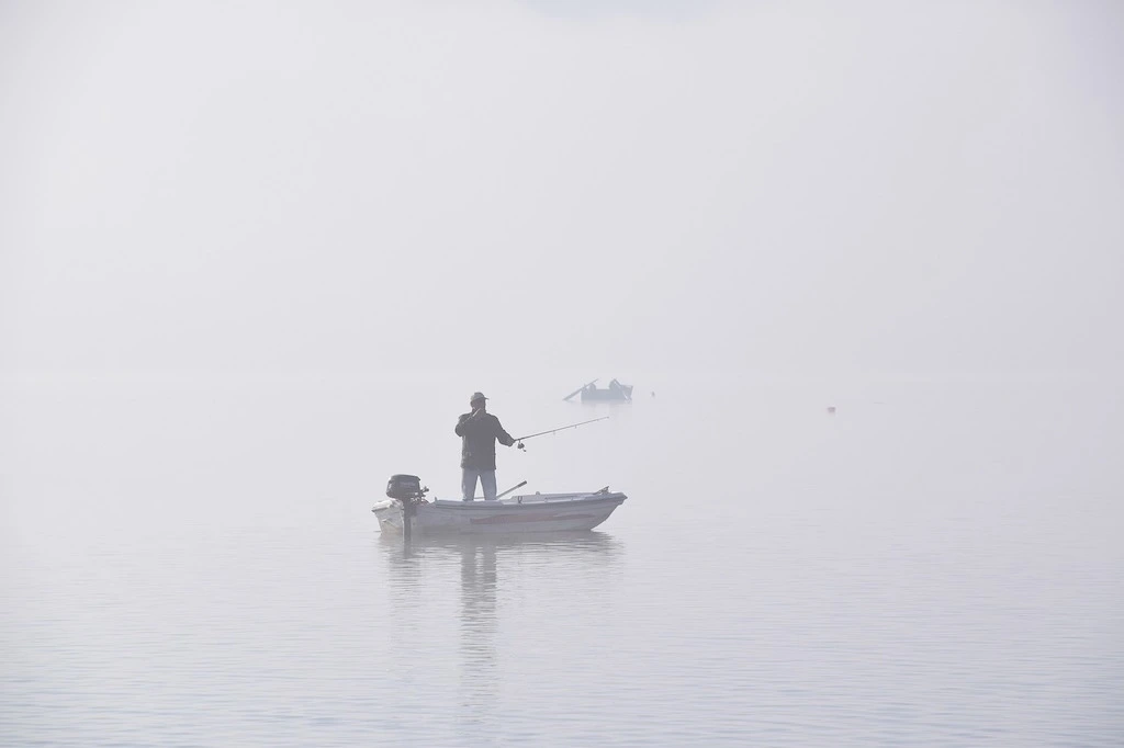 Fisherman Fishing on a Lake: Best Lake Fishing Tips